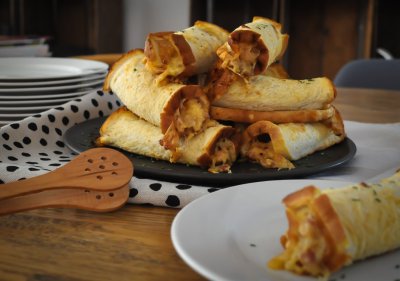 pile of southland cheese rolls nz arranged on a plate.