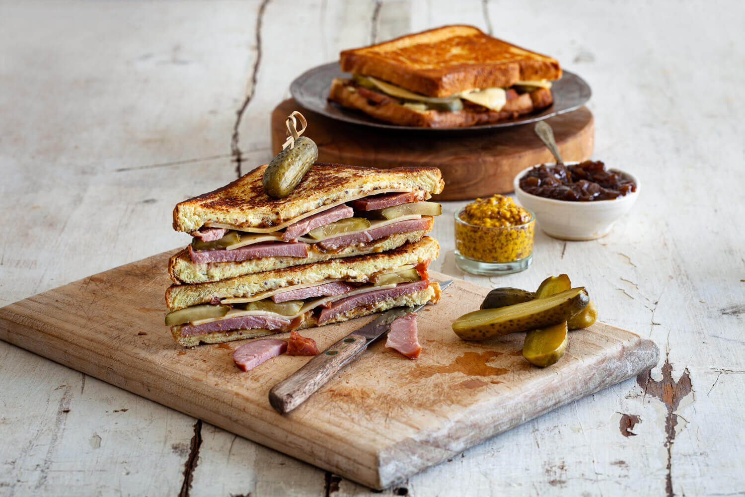 Loaded cheese toastie – triple cheese, ham off the bone, onion jam, gherkins. recipe using leftover christmas ham