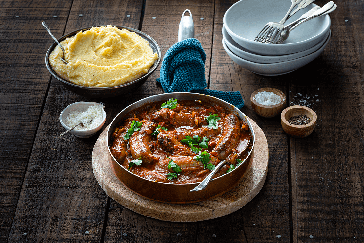 Quick Hellers Caramelised Onion Sausage with Cherry Tomato & Bacon Sauce and Polenta